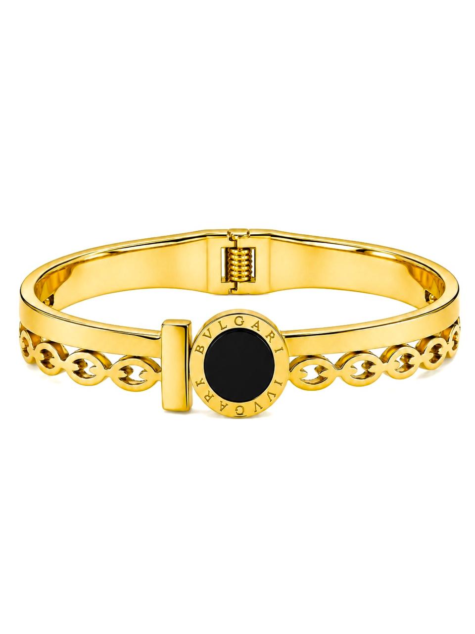 Gold hinged bangle with onyx accent